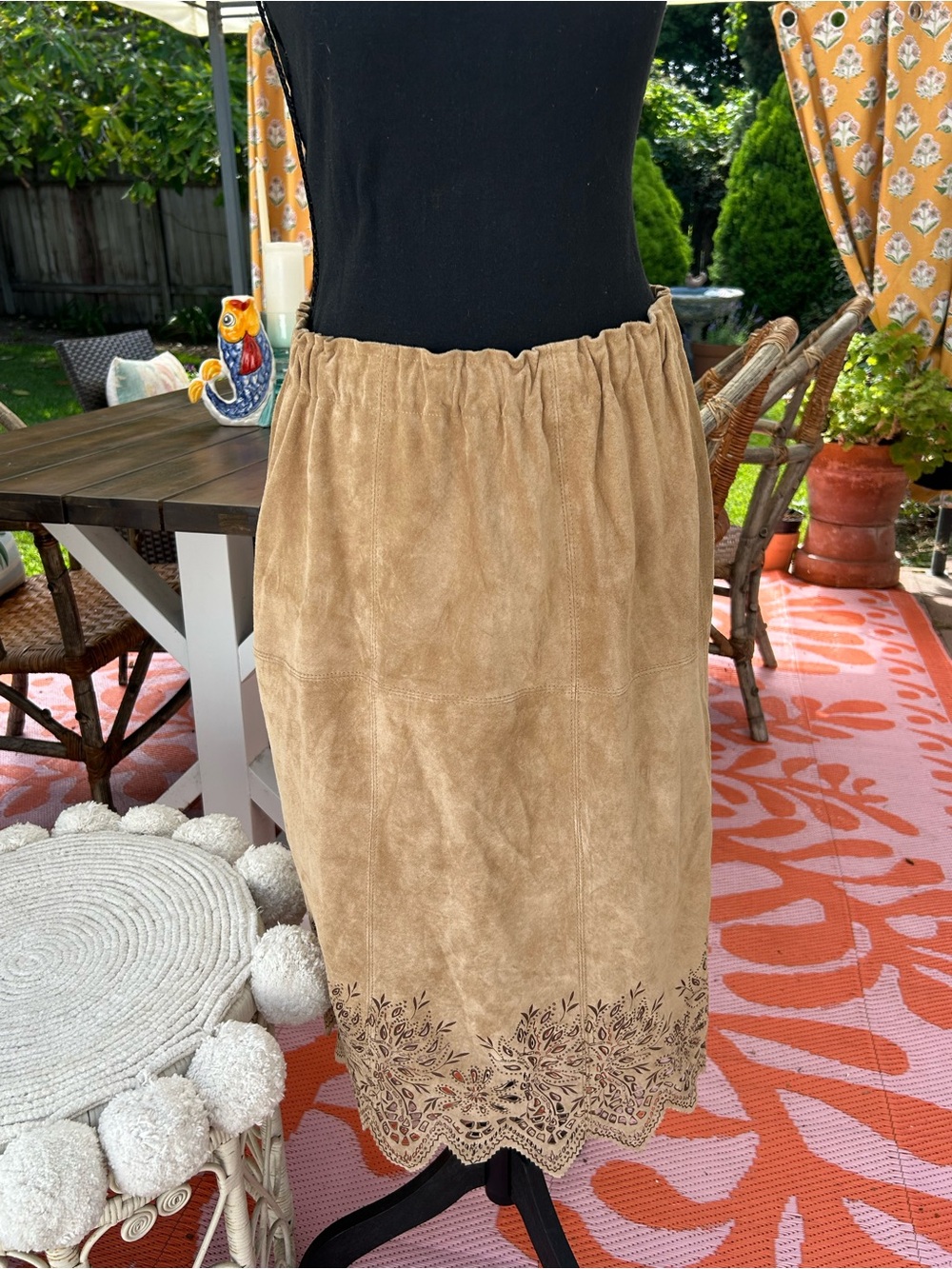 1970’s handmade suede skirt with cutouts.